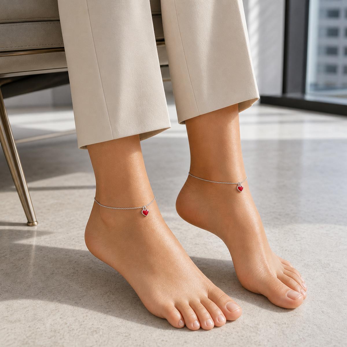 Silver Ruby Heart Anklet styled on both ankles