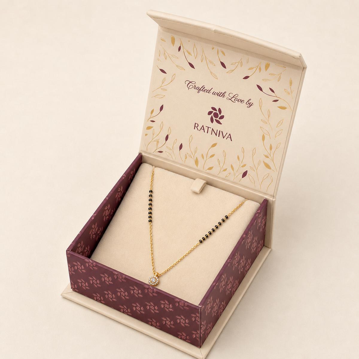 Yellow Gold Dewdrop Halo Mangalsutra Ratniva jewellery packaging