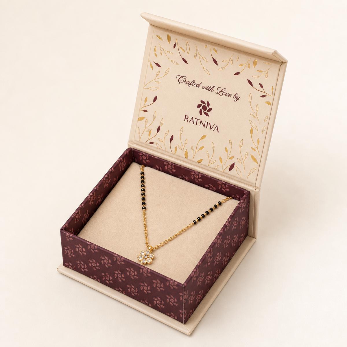 Yellow Gold Petal Spark Mangalsutra Ratniva jewellery packaging